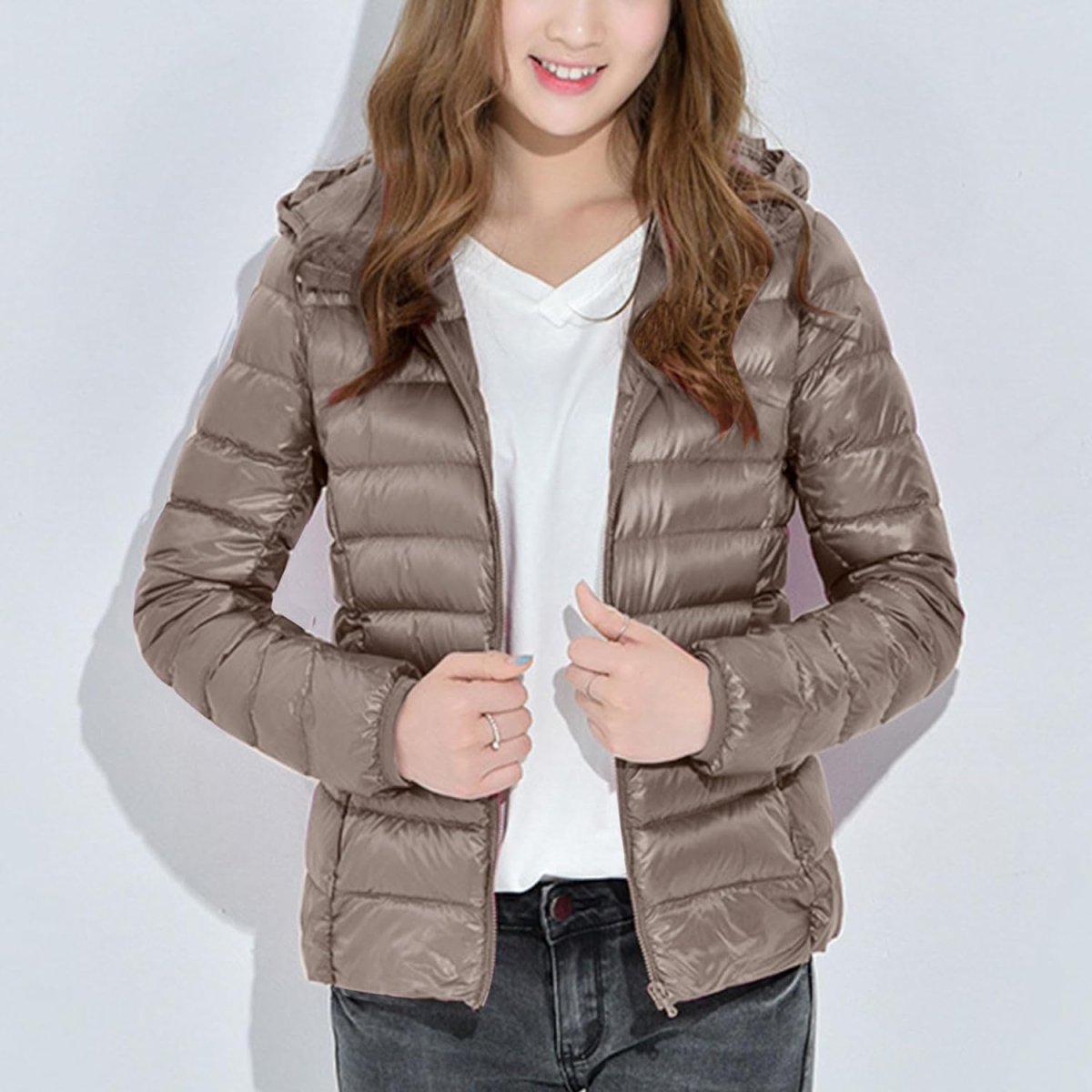 Women's slim lightweight puffer jacket with narrow quilting and a hood