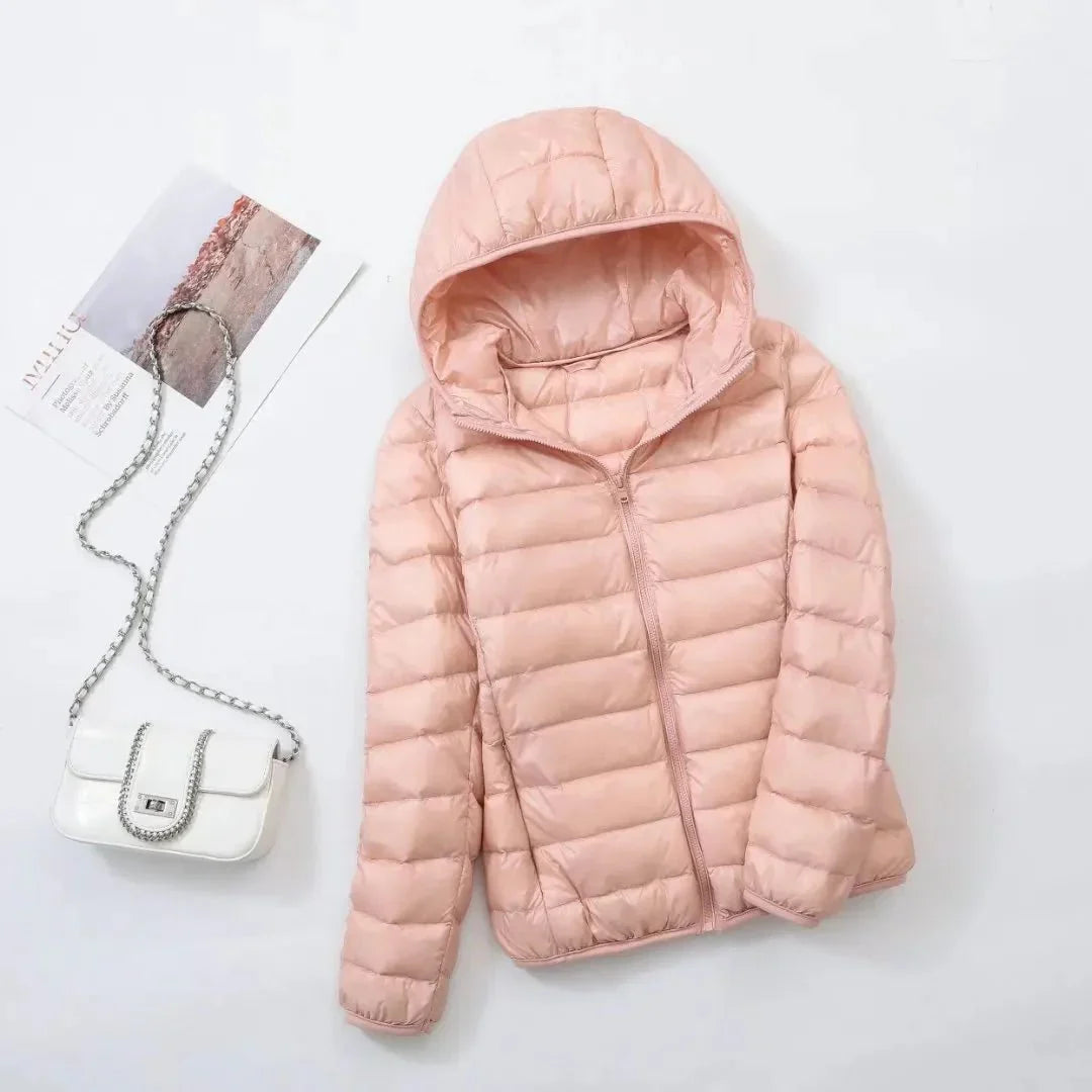 Women's slim lightweight puffer jacket with narrow quilting and a hood - light pink