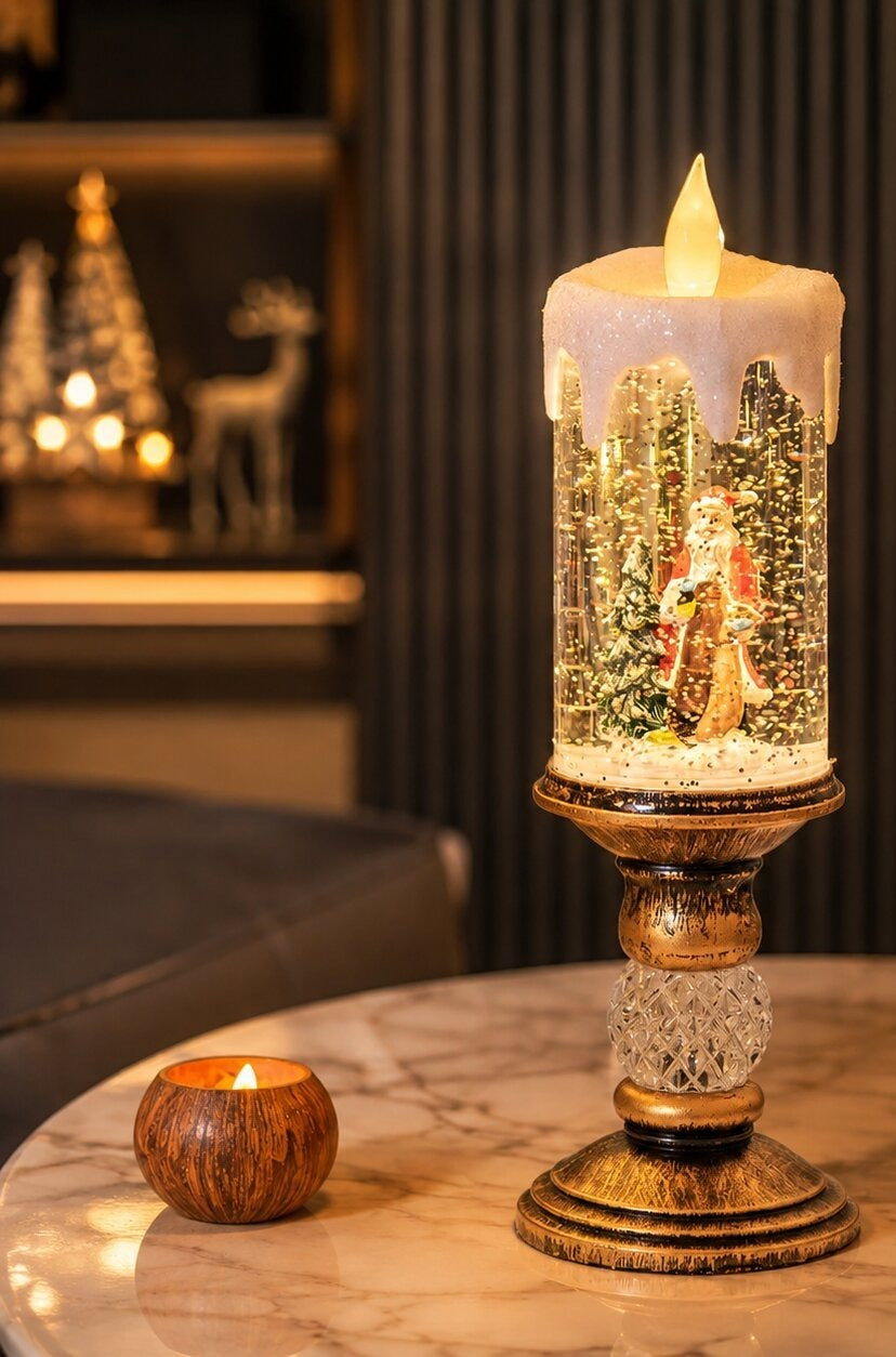 Snow globe candle with an LED flame and Santa on a tall stand