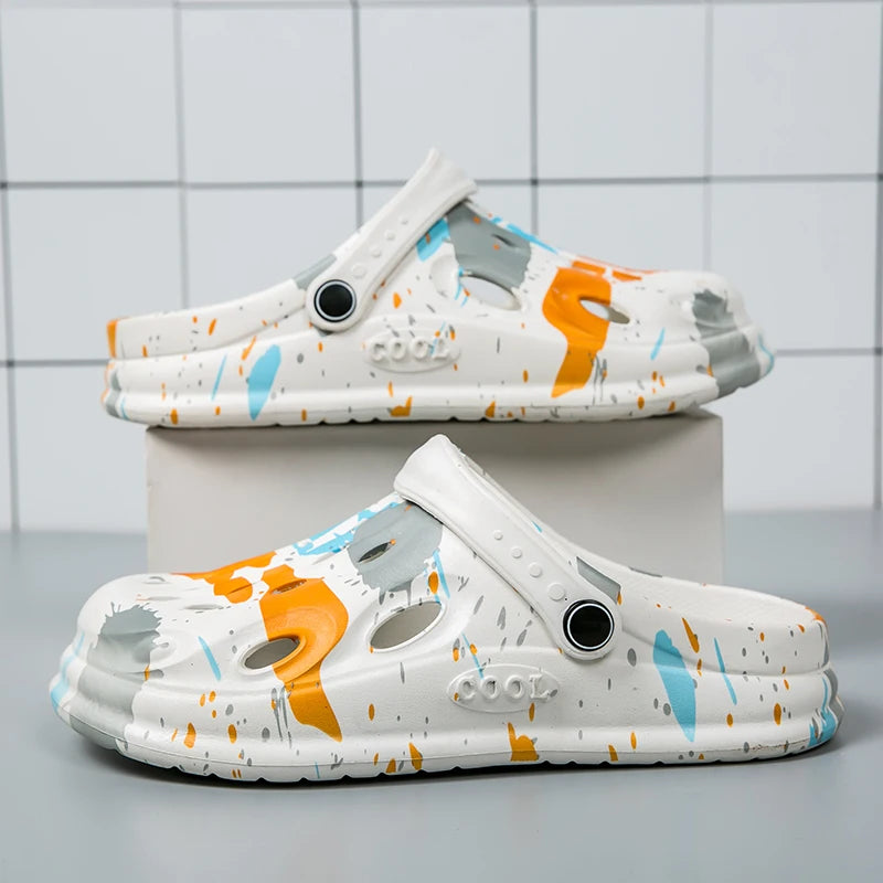 Clogs in EVA with a splatter print, vent holes and pivoting heel strap - white