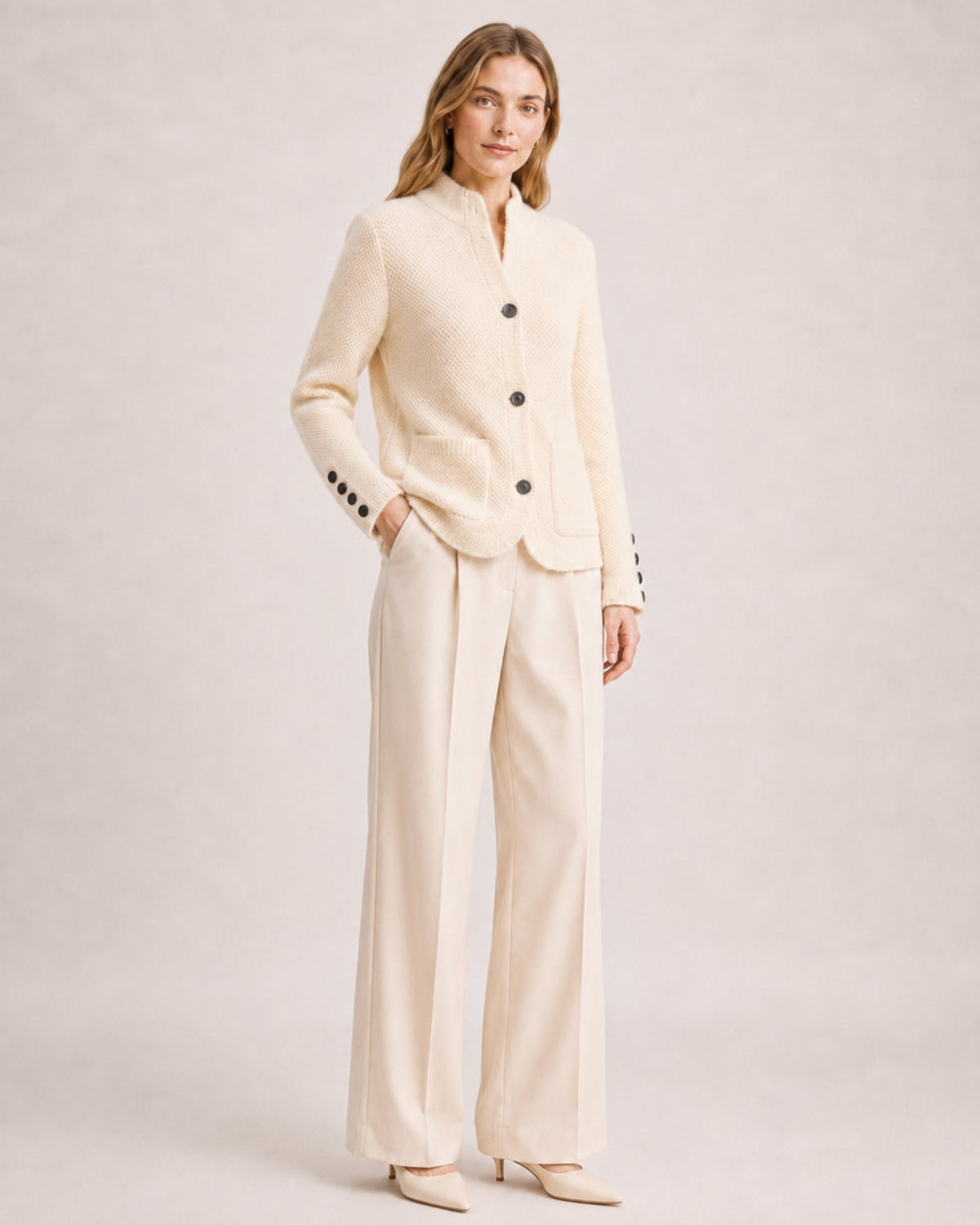 Women's firm knit cardigan with a stand collar and patch pockets
