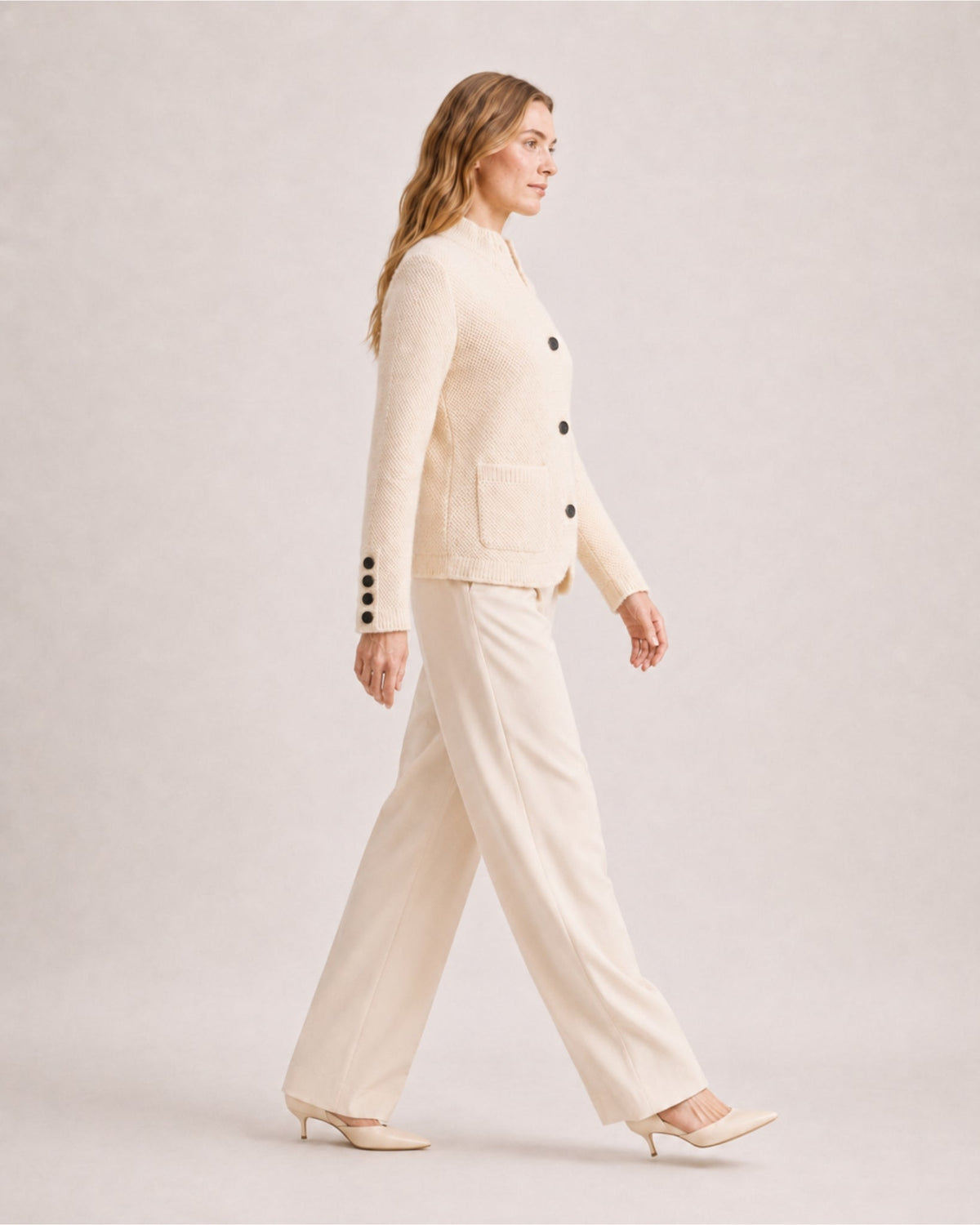 Women's firm knit cardigan with a stand collar and patch pockets