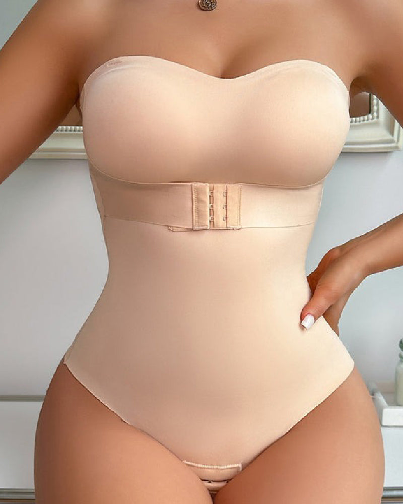 Strapless thong shapewear bodysuit with moulded cups and a hook-and-eye waistband