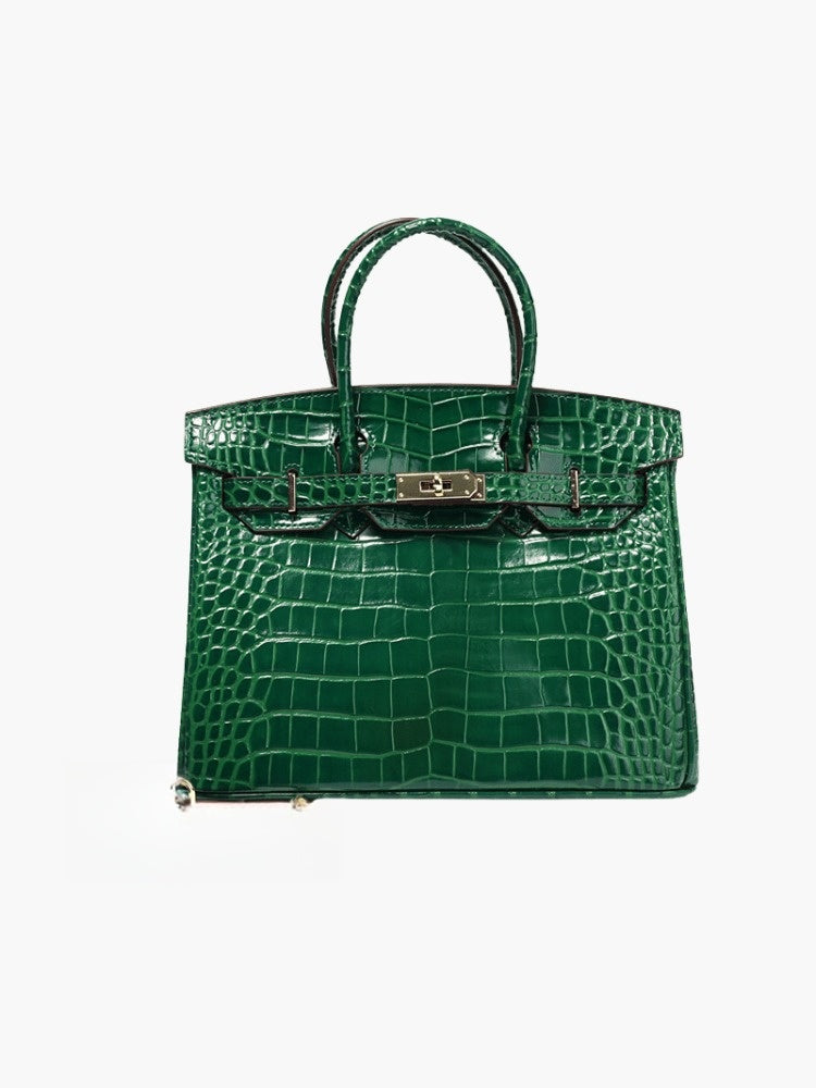 Structured top handle bag with two rolled handles, a flap with turn lock and a padlock - emerald croc