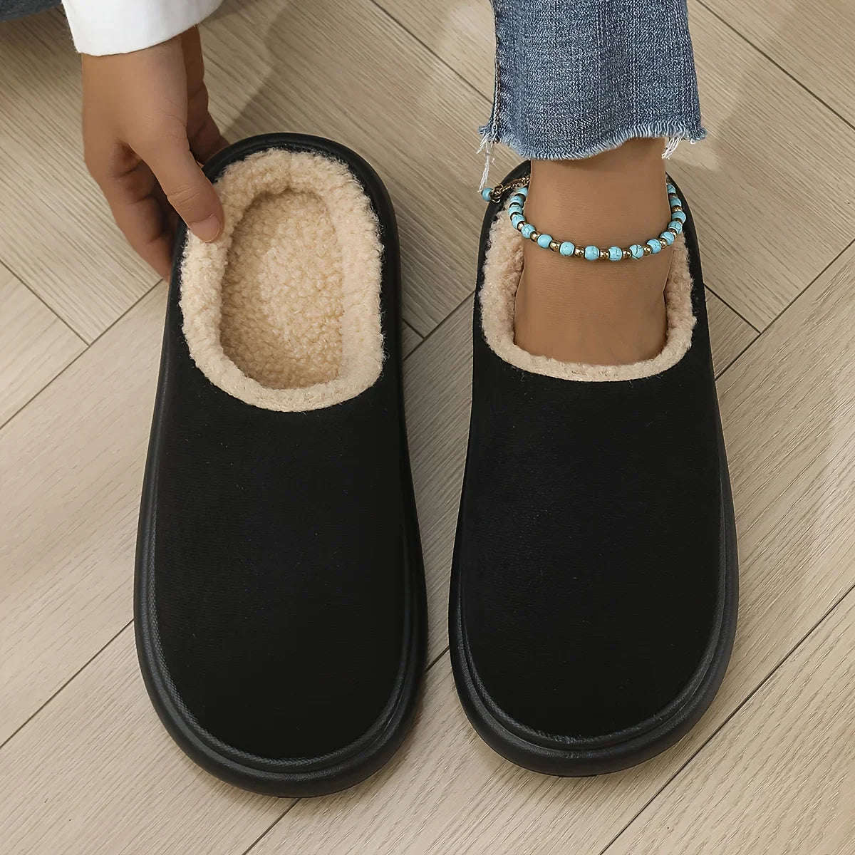 Slippers in a suede look with teddy lining, open back and rubber sole - black