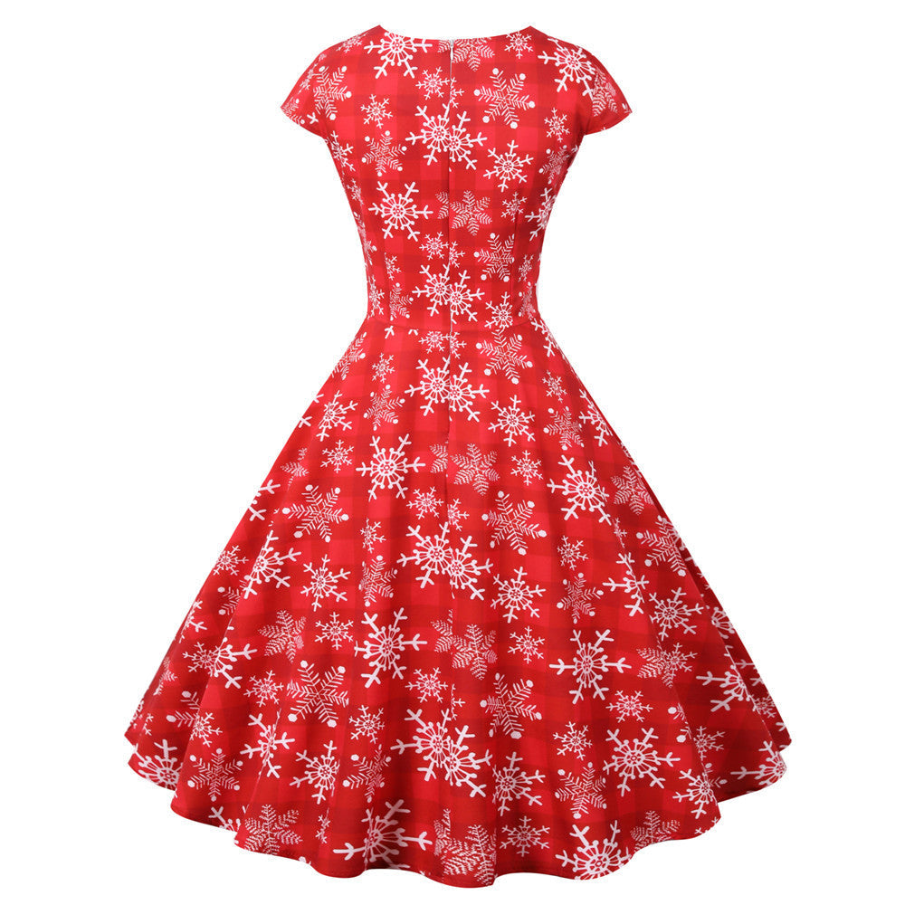 Women's swing Christmas dress with a wrap neckline, cap sleeves and full skirt
