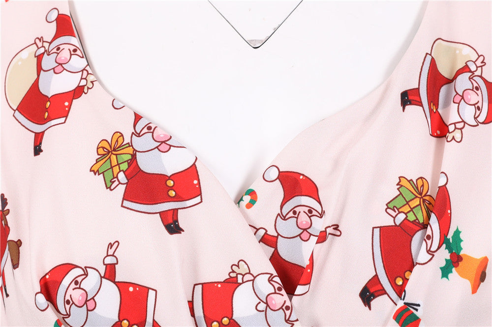 Women's swing Christmas dress with a wrap neckline, cap sleeves and full skirt