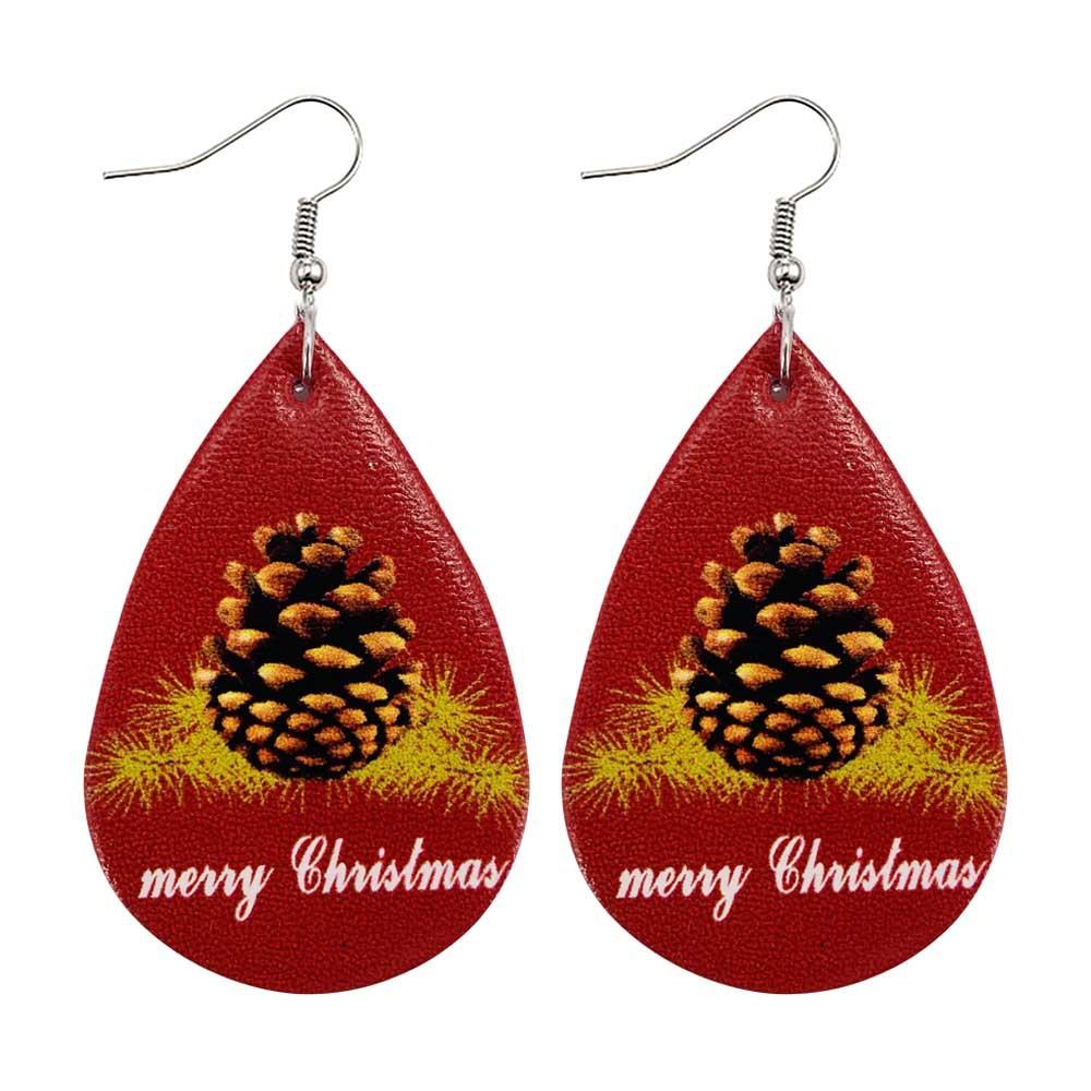 Faux leather teardrop Christmas earrings with a festive print on hooks - pine cone on red