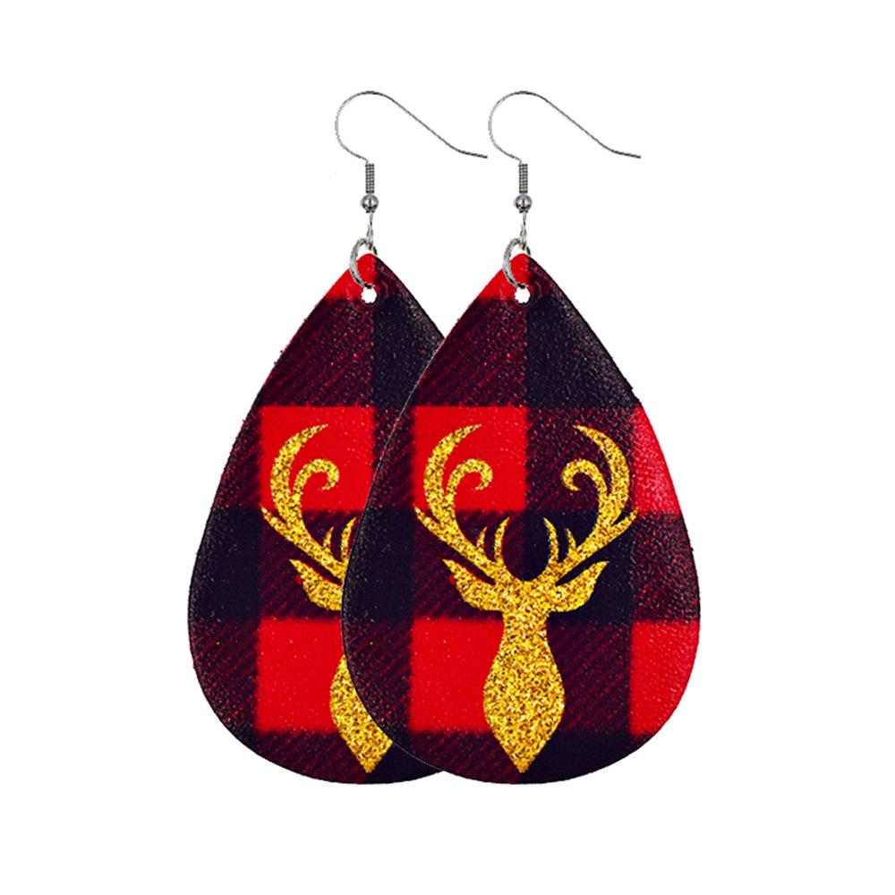 Faux leather teardrop Christmas earrings with a festive print on hooks - gold antlers on red check