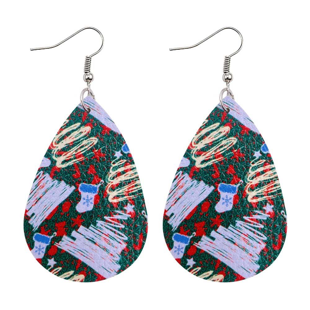 Faux leather teardrop Christmas earrings with a festive print on hooks - stockings on green