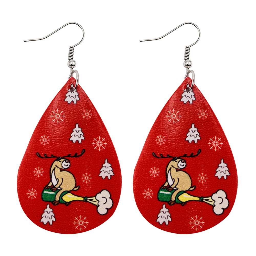Faux leather teardrop Christmas earrings with a festive print on hooks - flying reindeer