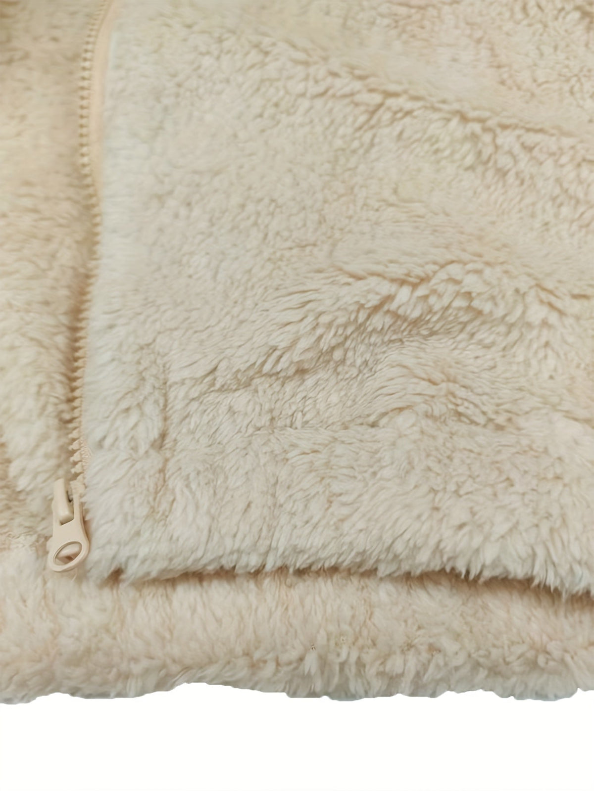 Women's teddy gilet with a high stand collar, full-length zip and side pockets