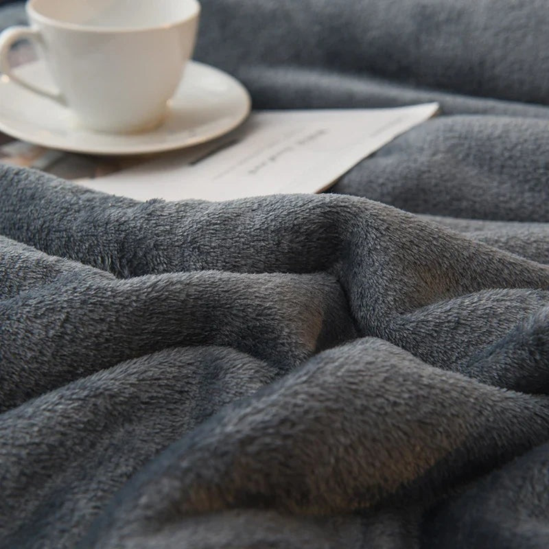 Thick sherpa blanket with a velvet-soft side on a bed - view 3