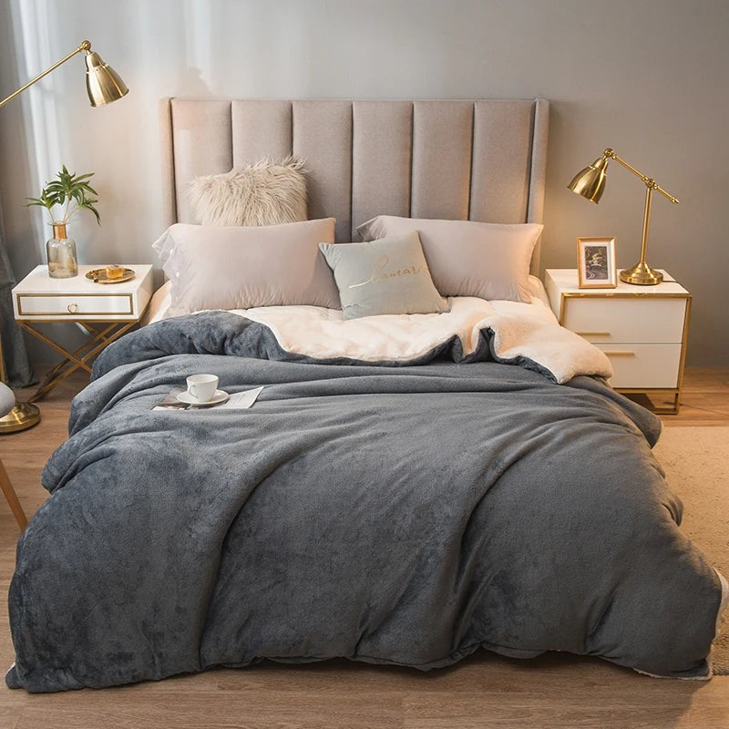 Thick sherpa blanket with a velvet-soft side on a bed - view 4