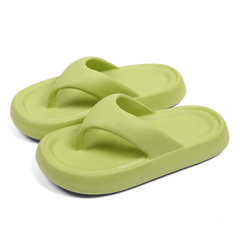 Flip flops with a thick, soft EVA sole and a wide flat toe strap - lime green