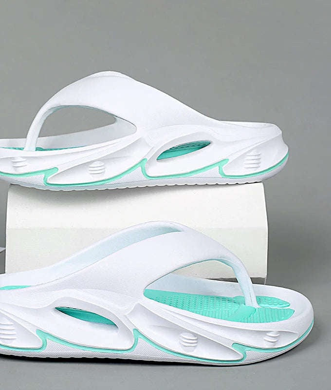 EVA flip flops with a thick sole and a two-tone nubbed footbed - white and mint