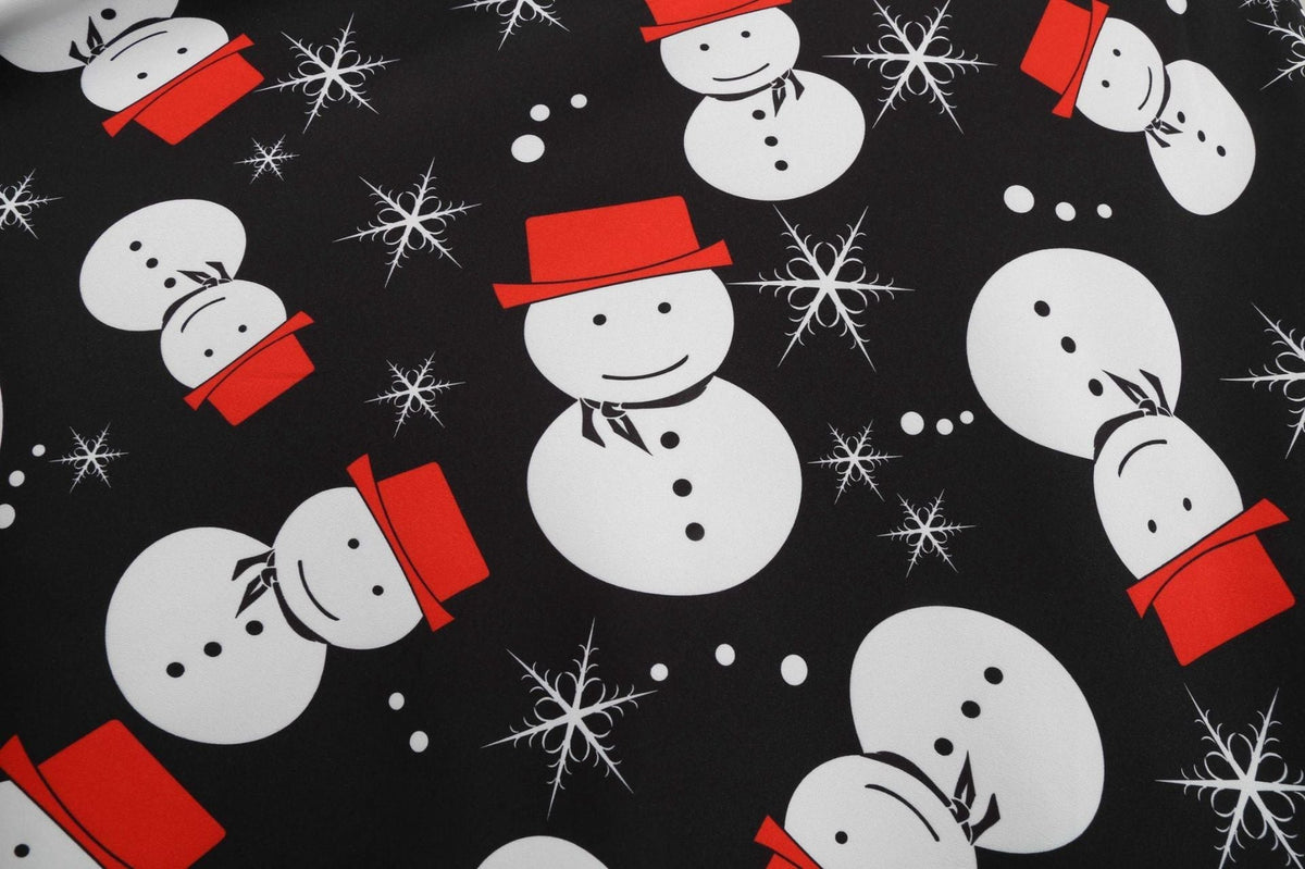 Women's black vintage Christmas dress with scalloped V-neck and snowman skirt