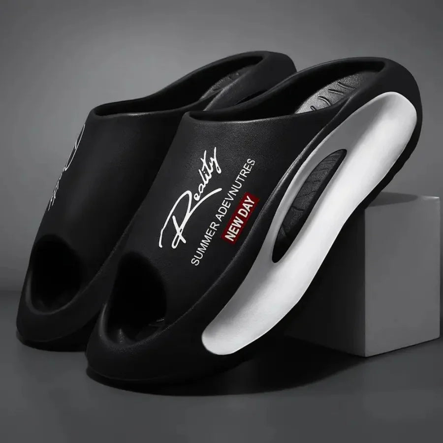 EVA sliders with a wavy footbed in a contrasting colour and thick sole - black / white