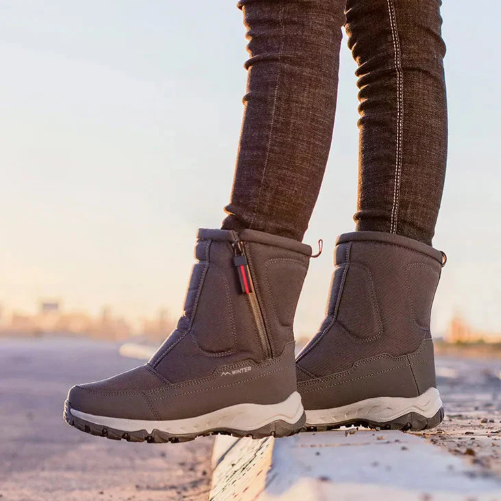 Unisex zip-front snow boots with teddy lining and lug sole