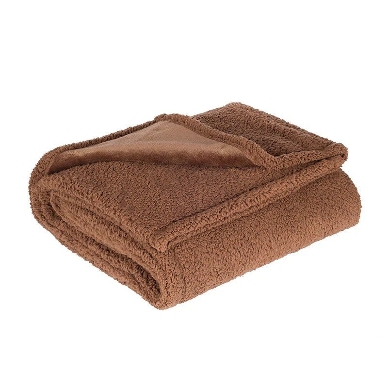 Waterproof teddy fleece throw, folded with the smooth side showing - brown