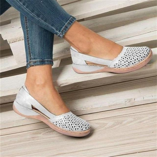 Women's wide fit ballet flats with a roomy cut-out toe and a hidden heel - white