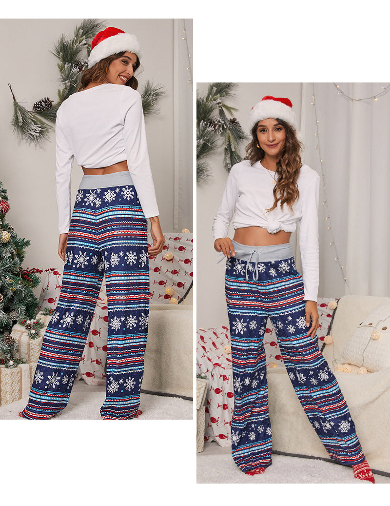 Women's wide-leg Christmas trousers with a high drawstring waist and festive print