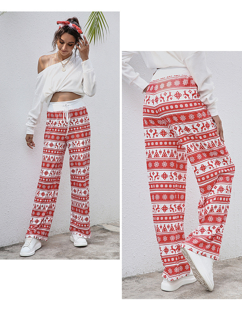 Women's wide-leg Christmas trousers with a high drawstring waist and festive print