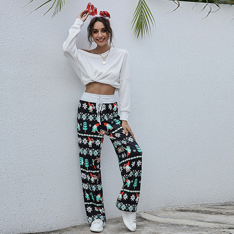 Women's wide-leg Christmas trousers with a high drawstring waist and festive print - black gnome