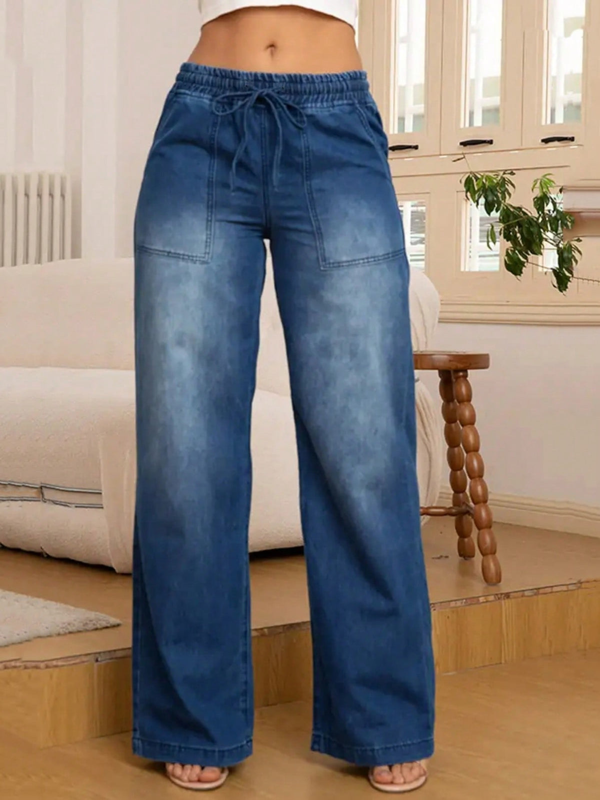 Wide leg jeans for women with an elastic drawstring waist and patch pockets - dark blue