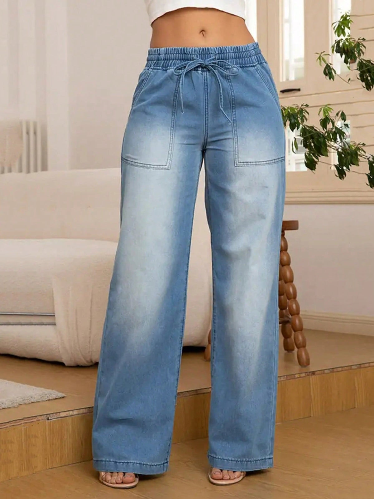 Wide leg jeans for women with an elastic drawstring waist and patch pockets - light blue