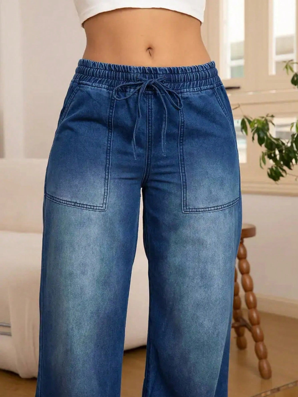 Wide leg jeans for women with an elastic drawstring waist and patch pockets - view 9