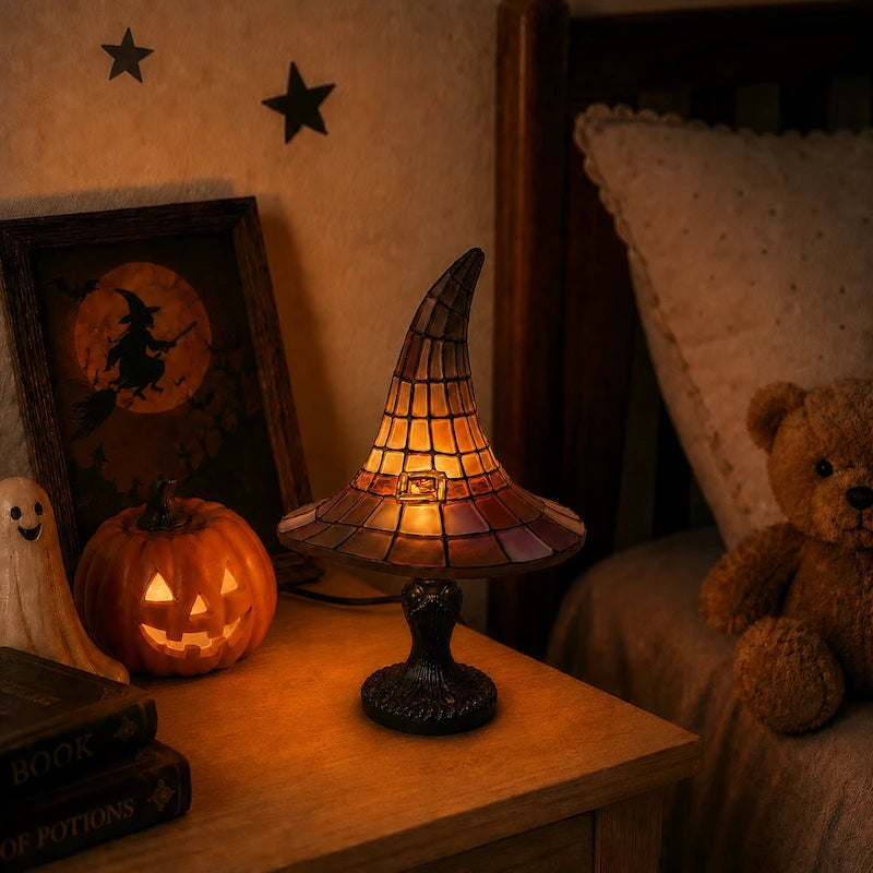 Table lamp shaped like a witch's hat with a coloured mosaic shade