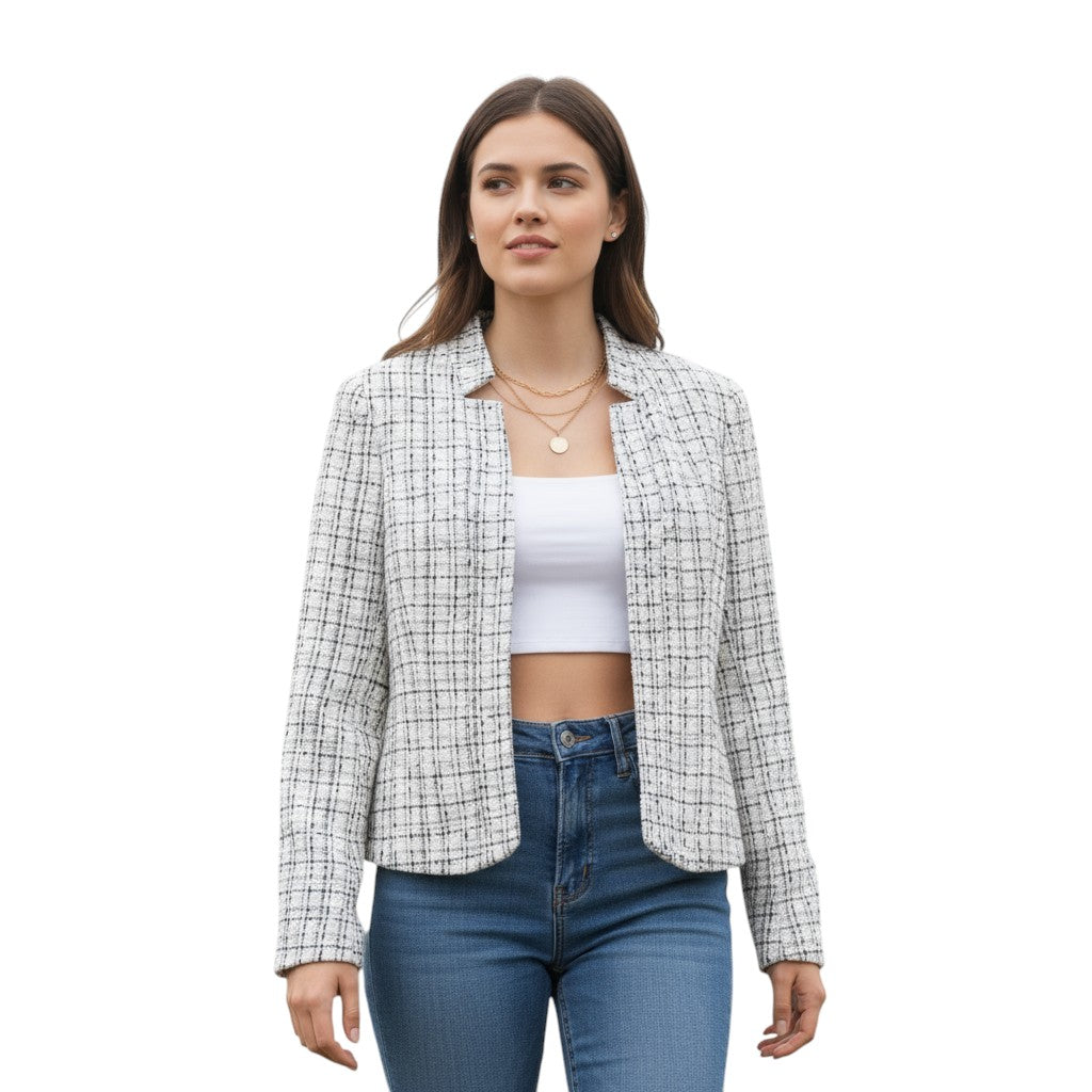 Collarless tweed jacket with a frayed trim, worn open