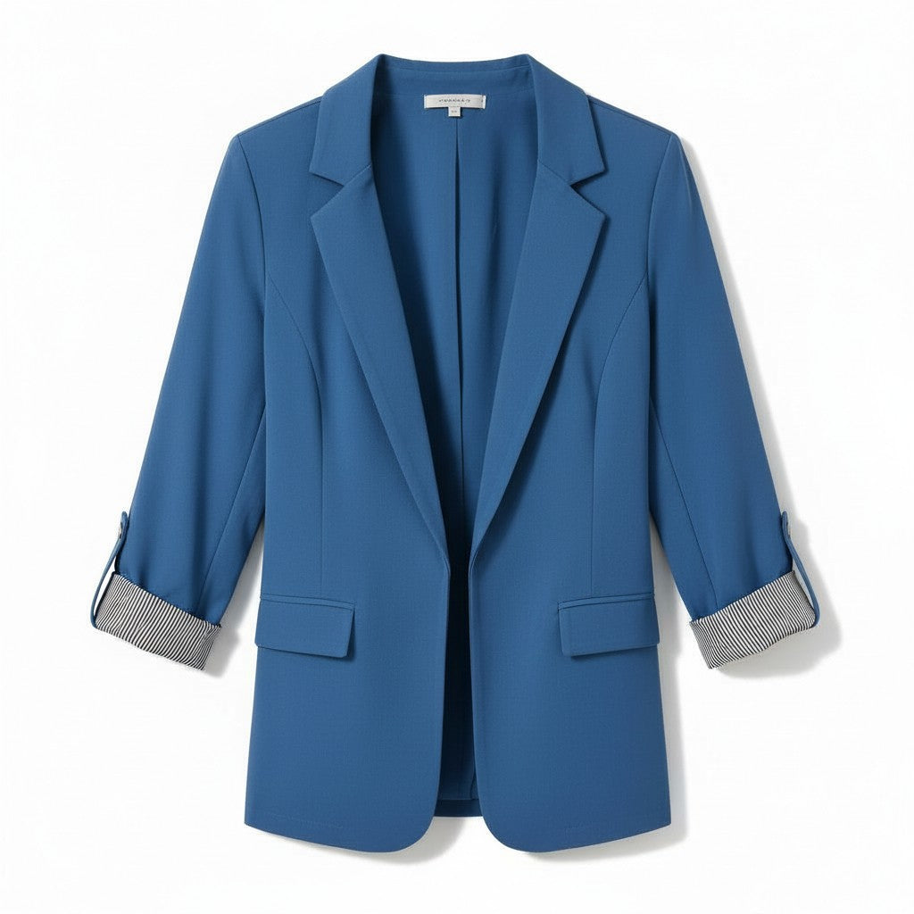 Tailored blazer with a notch lapel and cuffs turned back over a striped lining