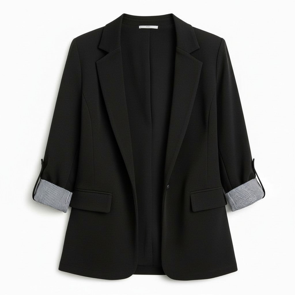 Tailored blazer with a notch lapel and cuffs turned back over a striped lining