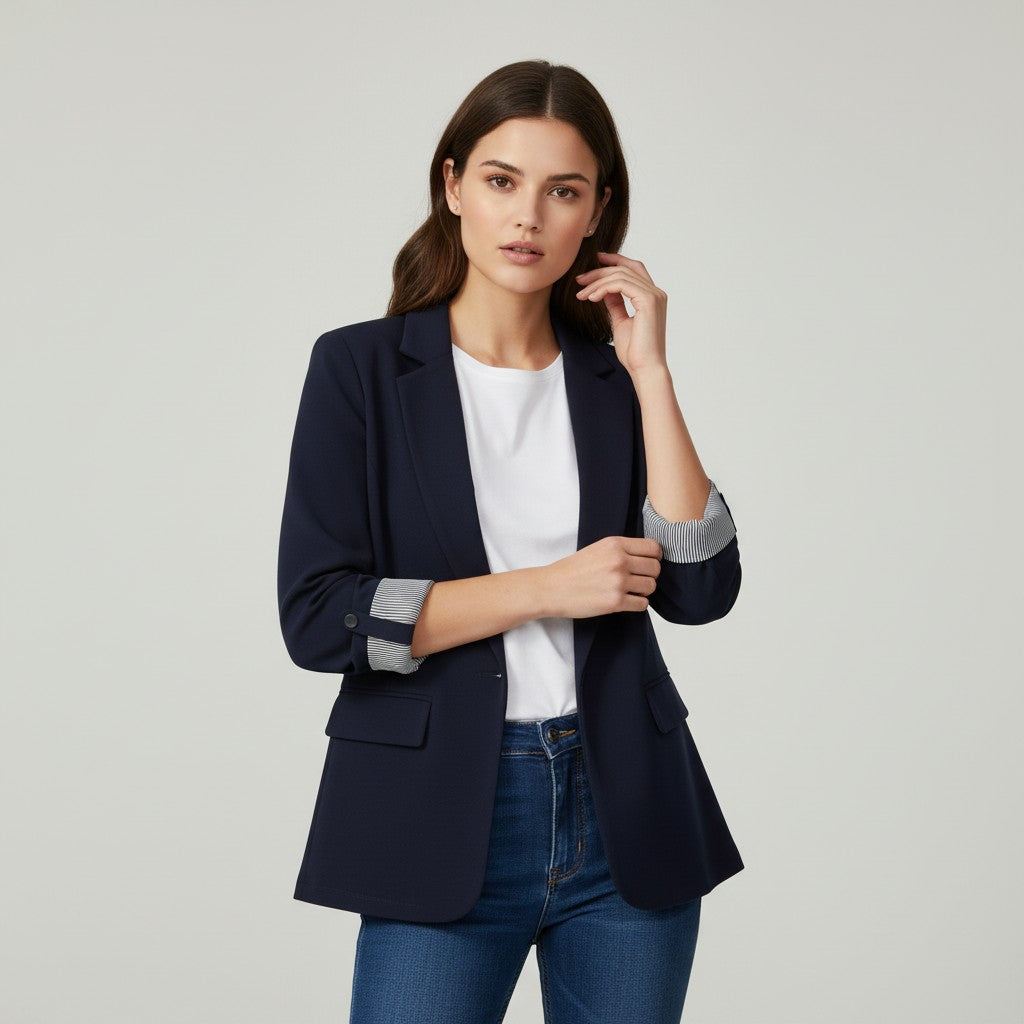 Tailored blazer with a notch lapel and cuffs turned back over a striped lining in navy