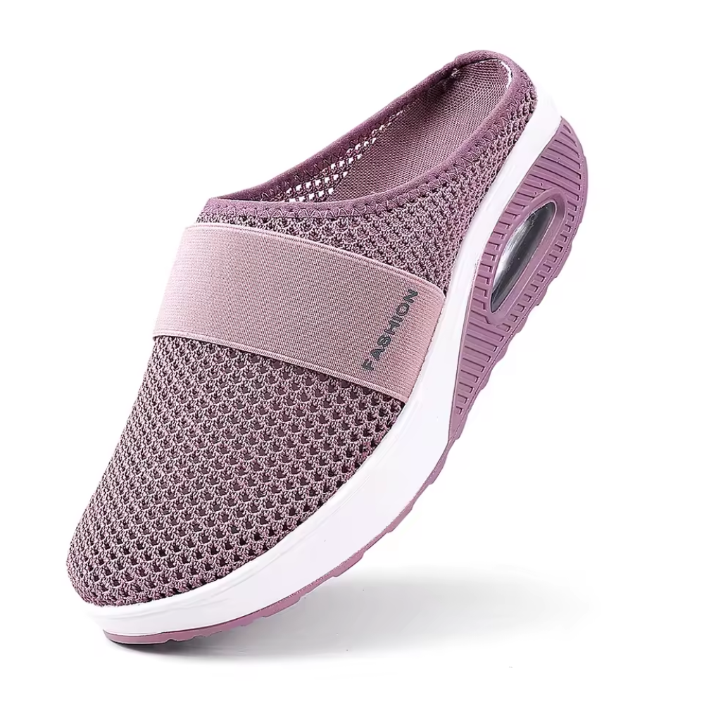 Women's backless mesh trainers with an air cushion sole