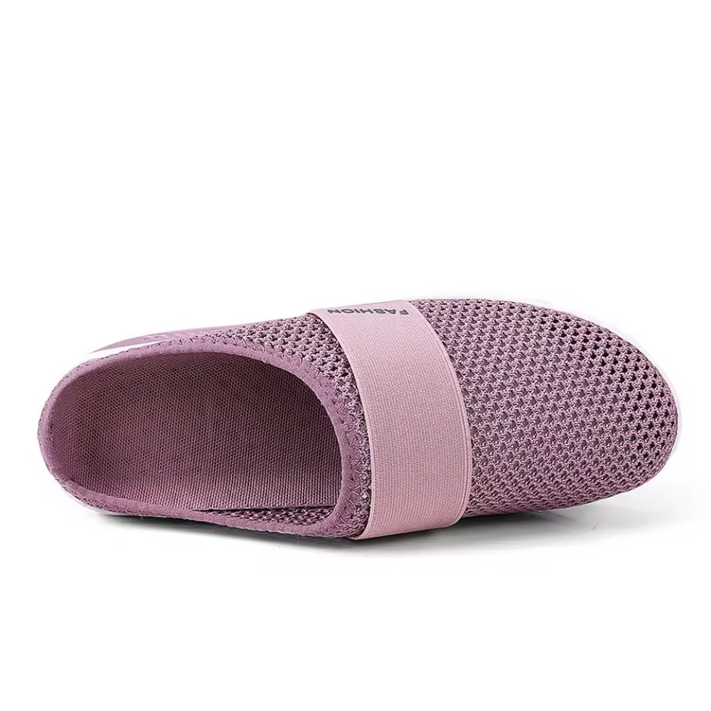 Women's backless mesh trainers with an air cushion sole