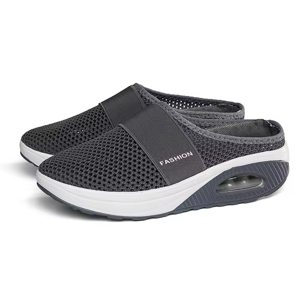 Women's backless mesh trainers with an air cushion sole