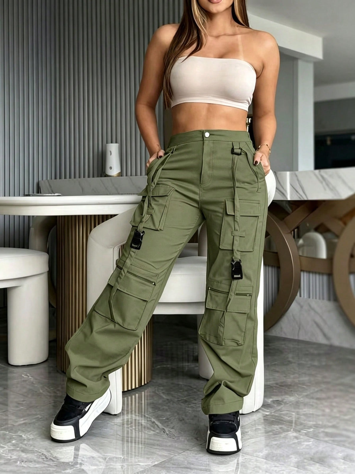 Cargo trousers for women with many pockets, loops and straps on the legs and a straight wide leg - view 12