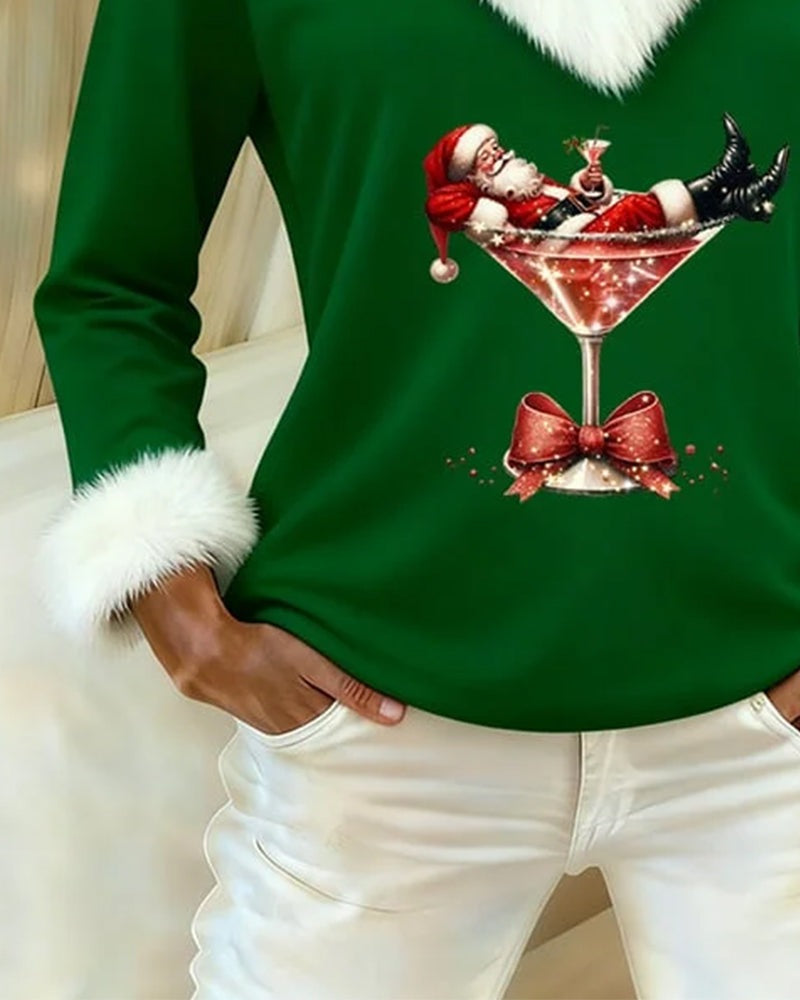 Women's Christmas top with a V-neck, fluffy white trim and Santa print - green