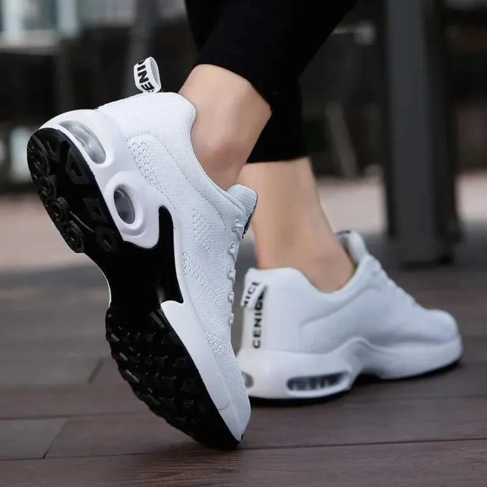 Women's ergonomic knit trainers with an air cushion sole
