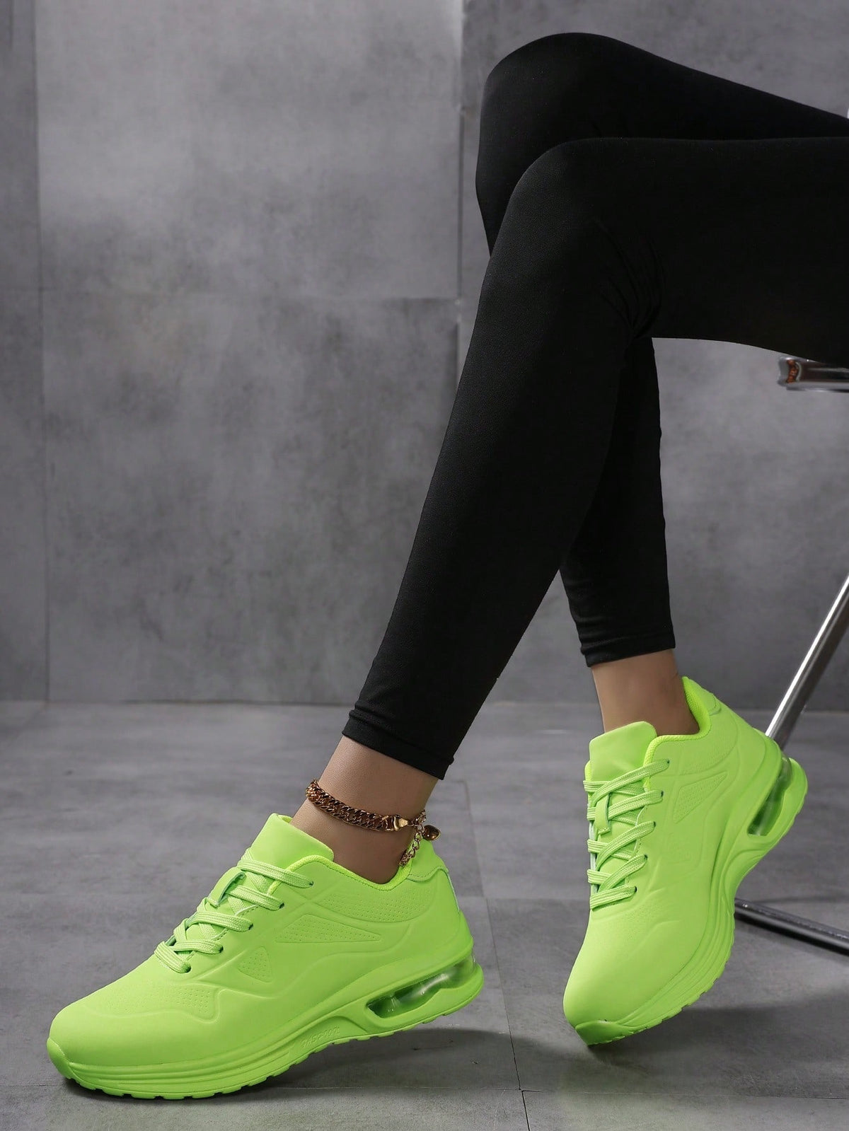 Faux leather lace-up trainers for women with chunky tread and visible air cushion in the heel - view 8