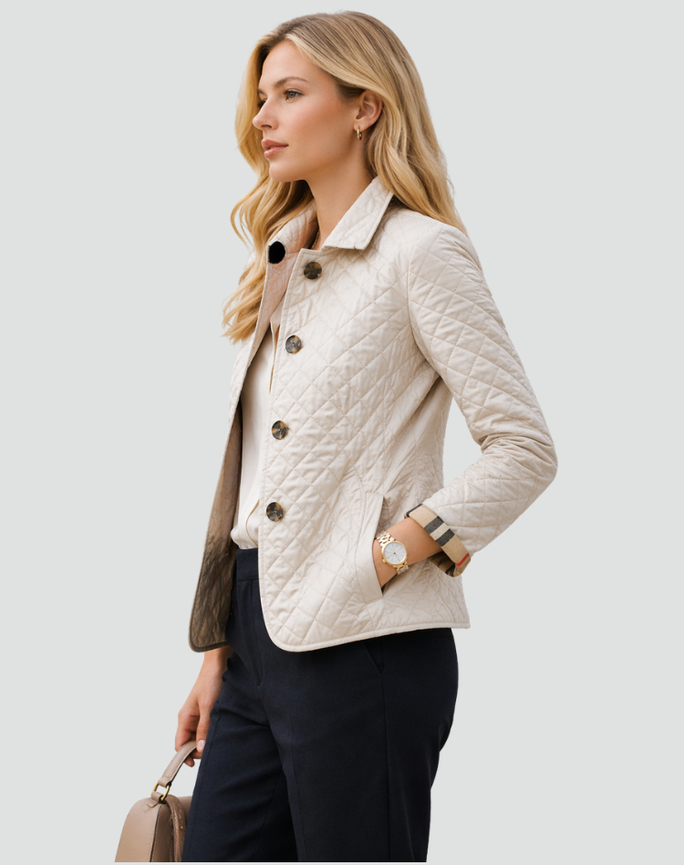 Women's fitted quilted jacket with a flat collar, button front and slip pockets