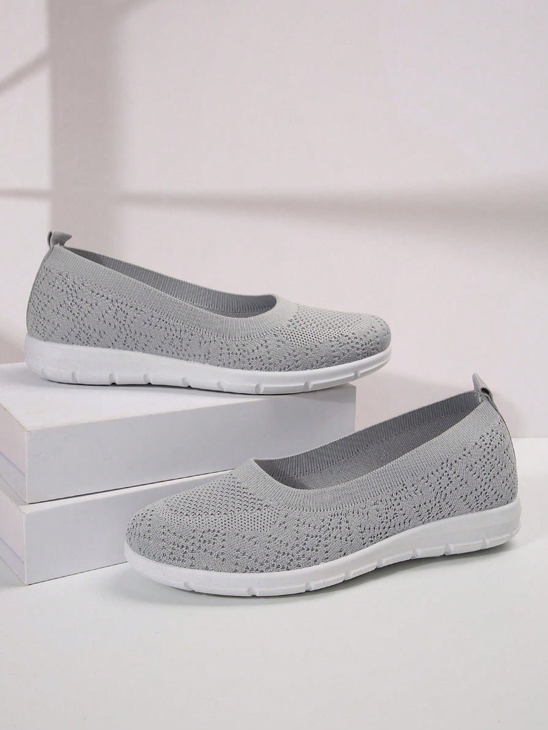 Flat knit shoes for women with low slip-on cut, heel pull tab and flexible tread sole - light grey