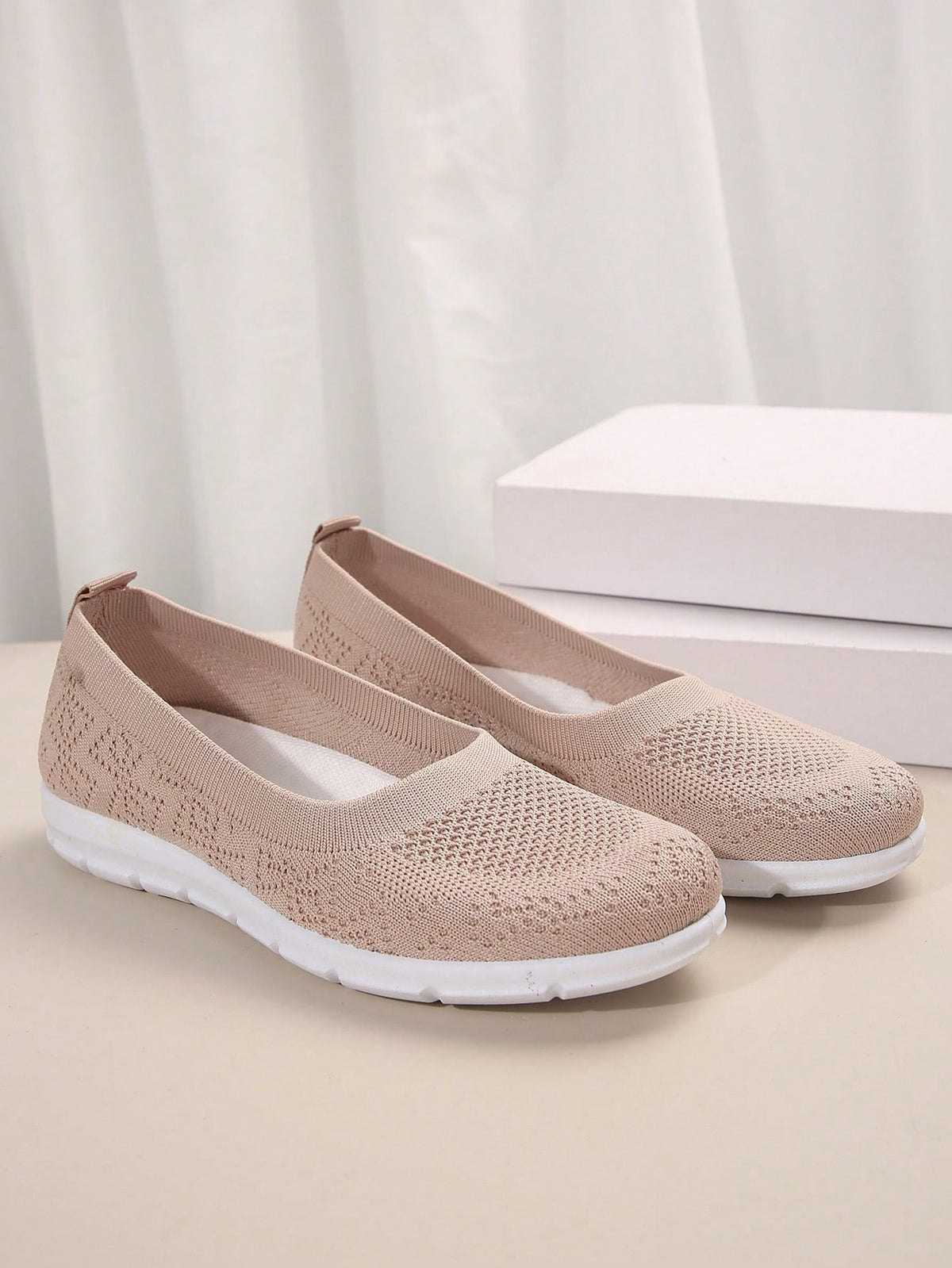 Flat knit shoes for women with low slip-on cut, heel pull tab and flexible tread sole - blush pink