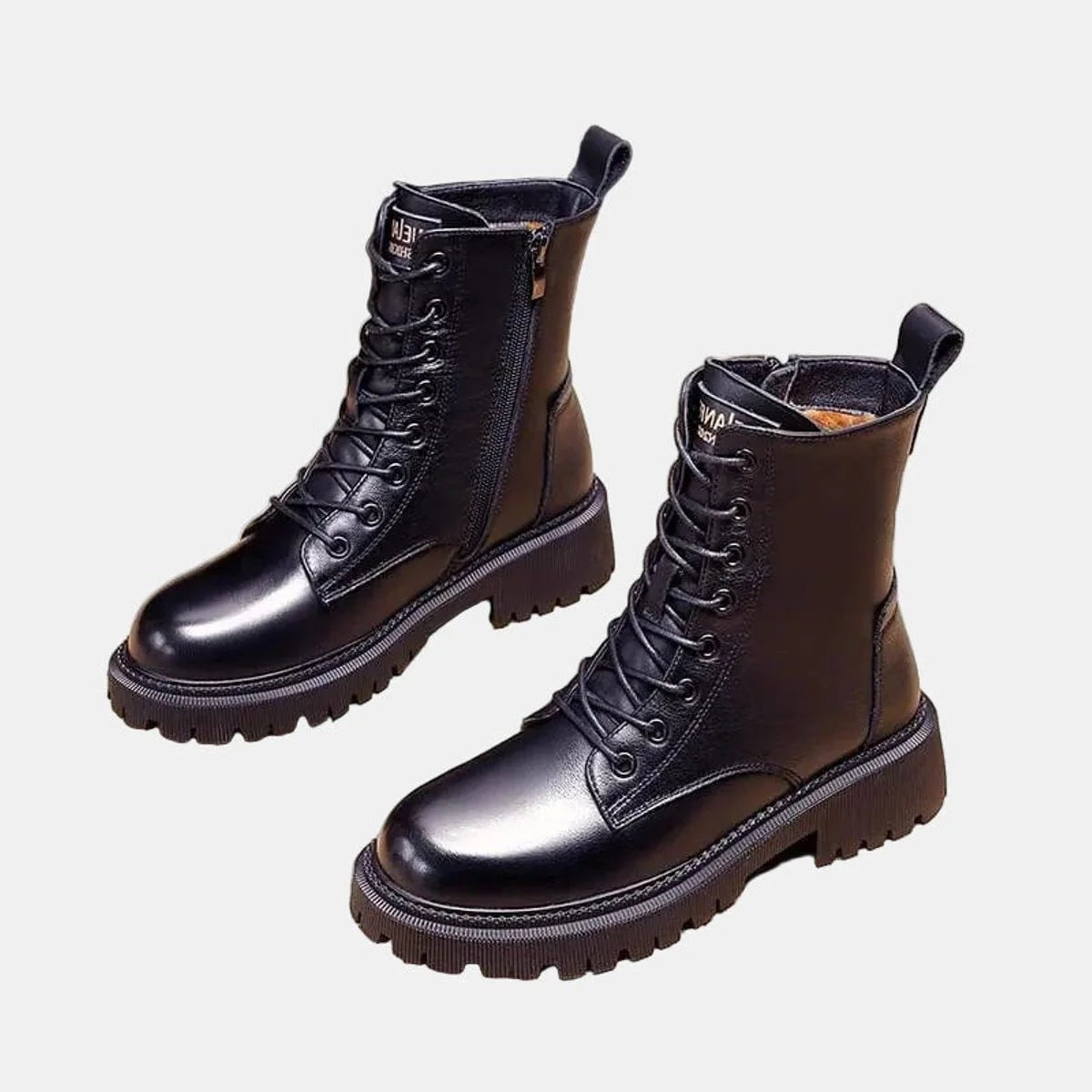 Women's fleece-lined combat boots with laces, a side zip and a lug sole