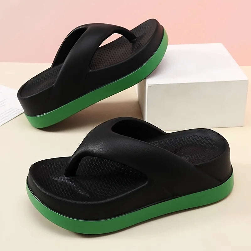 Flip flops with a wide strap, textured footbed and thick sole in a contrast colour - black