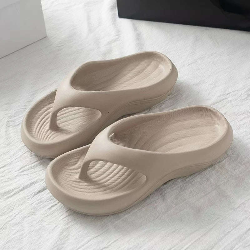EVA flip flops with a ridged footbed and a thick curved sole - taupe