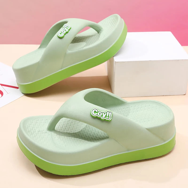 Women's flip flops in EVA with a thick two-tone platform sole and a wide soft strap - light green